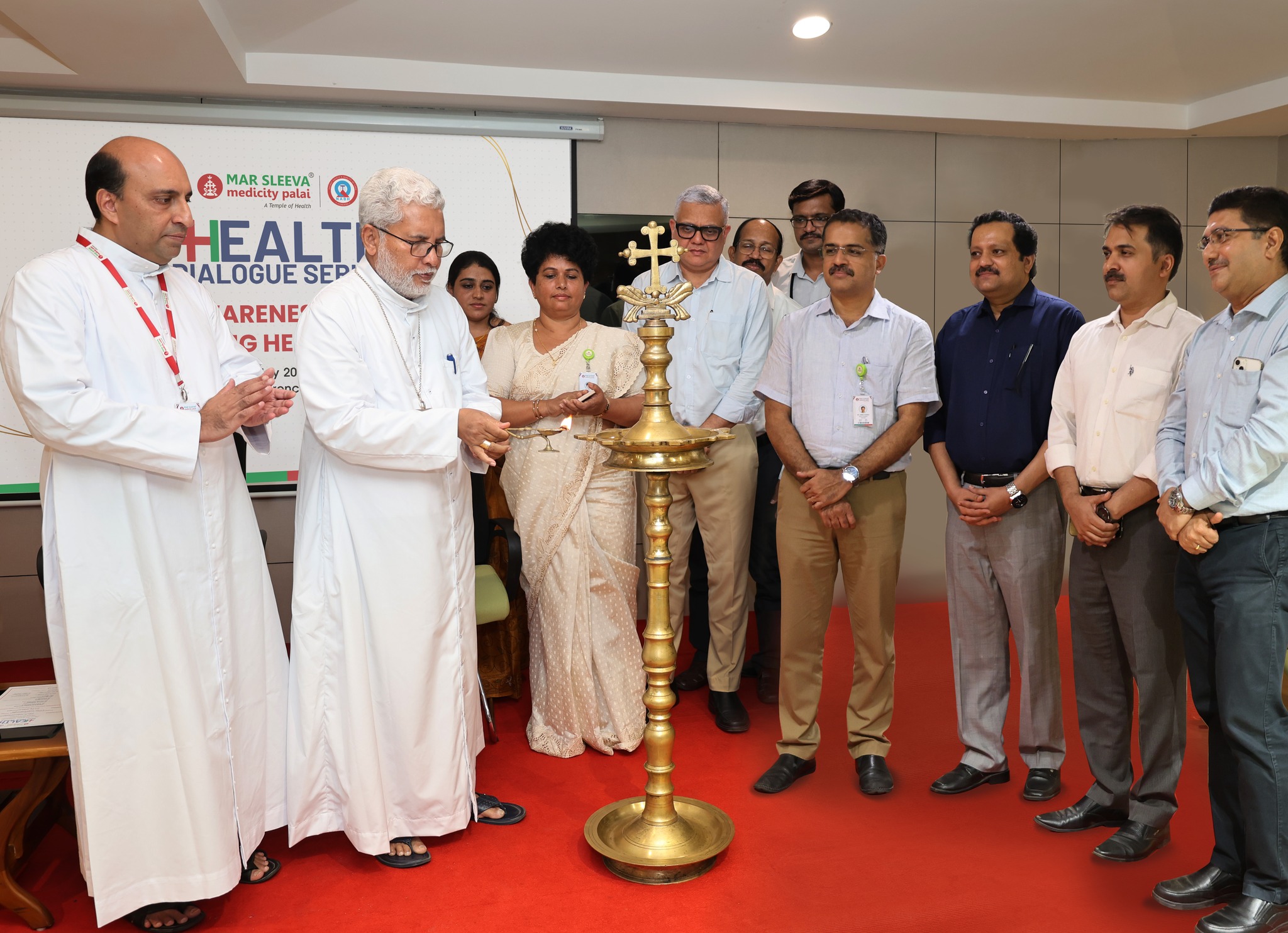 The inauguration of the 'Health Dialogue Series' by His Excellency Mar Joseph Kallarangatt, Founder & Patron, alongside the presence of Msgr. Dr. Joseph Kaniyodickal, Managing Director