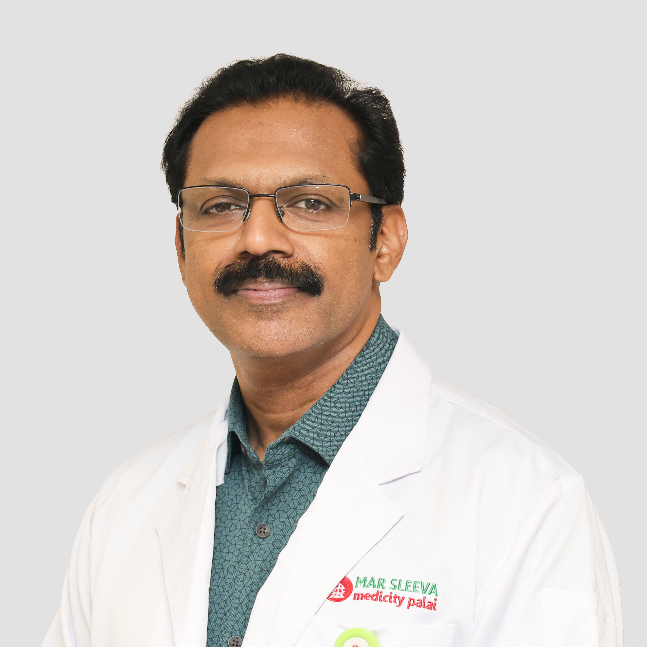 Dr. Rajesh V